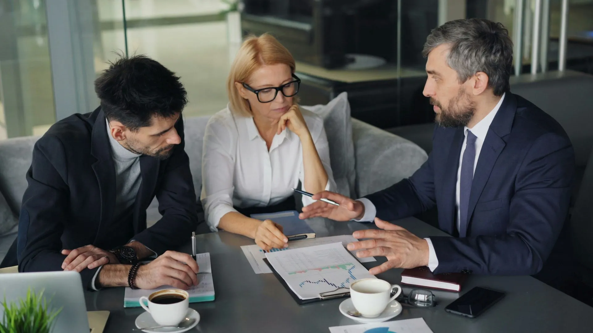 Procurement consultant reviewing performance evidence with an enterprise team